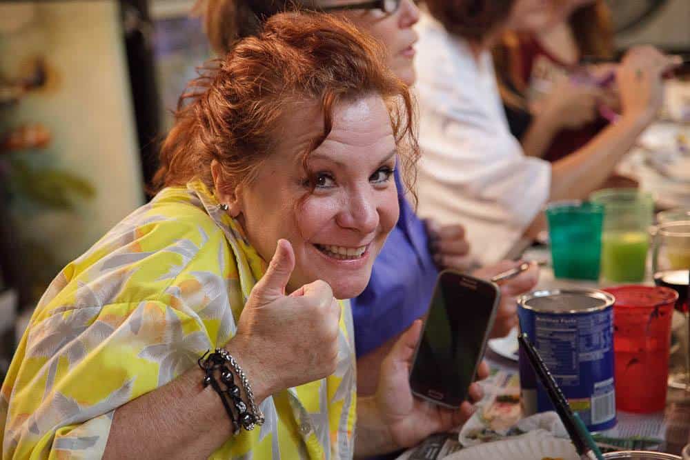 Smiling artist at creative workshop by My Favorite Art Place