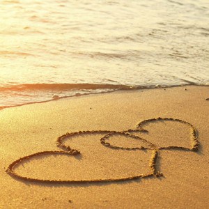 Hearts engraved in the sand