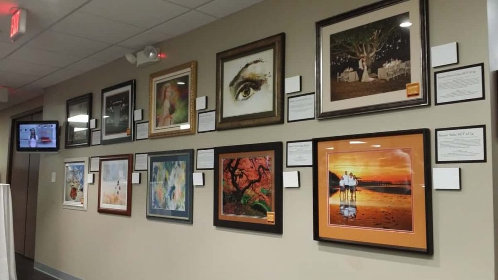 Office gallery wall with framed art by My Favorite Art Place