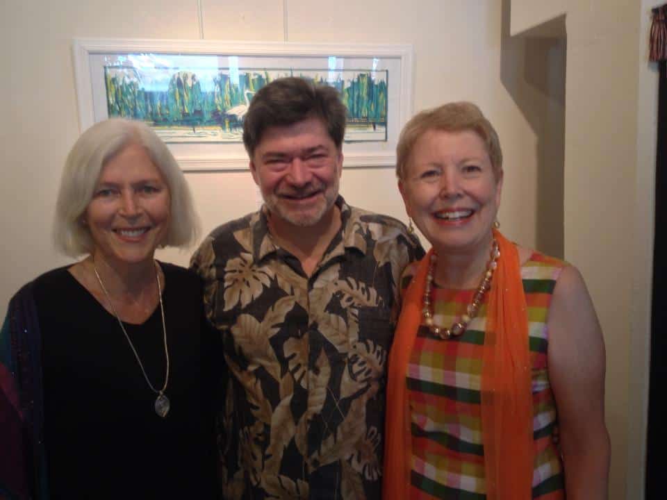 Happy customers with framed art by My Favorite Art Place