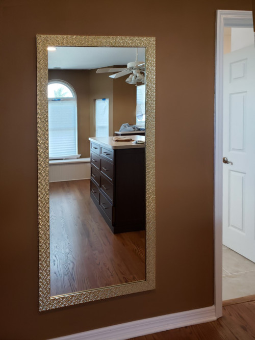 Hallway entry with framed mirror by My Favorite Art Place