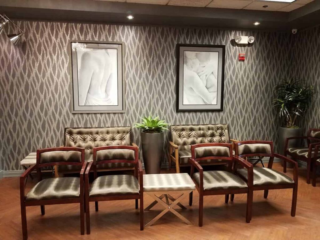 Waiting room seating with framed artwork by My Favorite Art Place