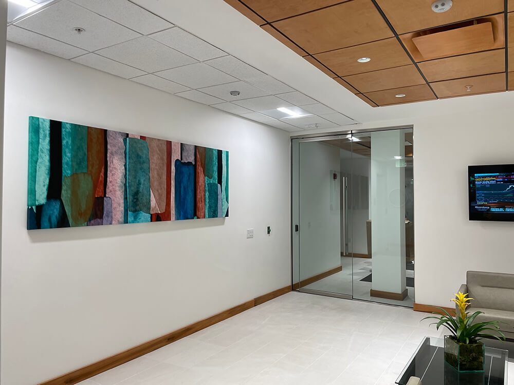 Office hallway featuring colorful canvas wall art by My Favorite Art Place