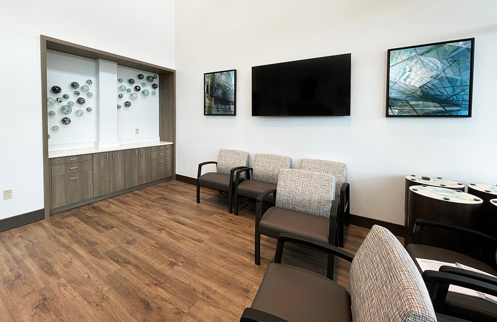 Reception seating area with digital wall art by My Favorite Art Place