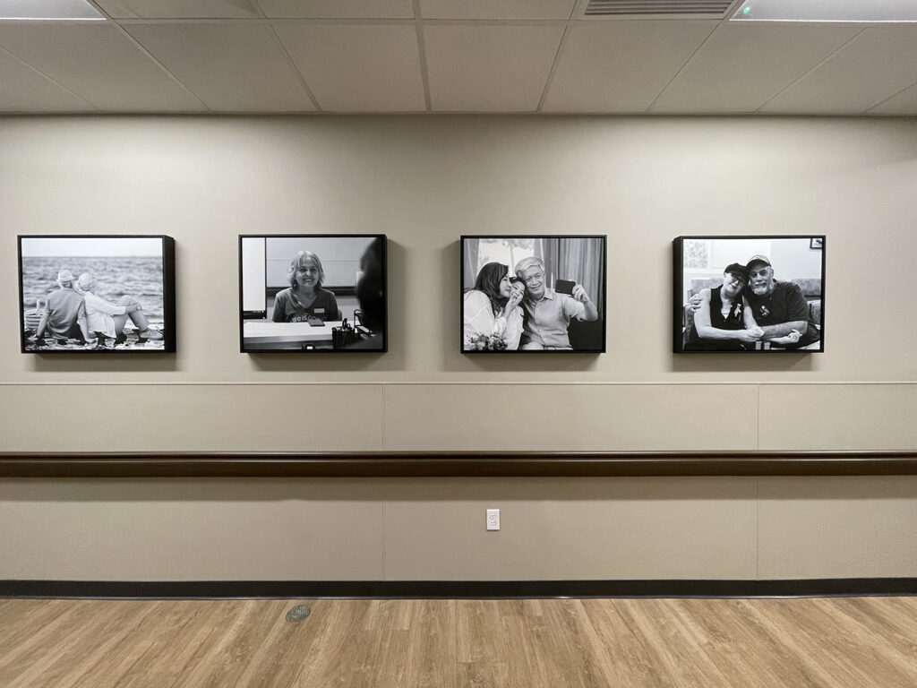 Medical hallway with photography wall display by My Favorite Art Place