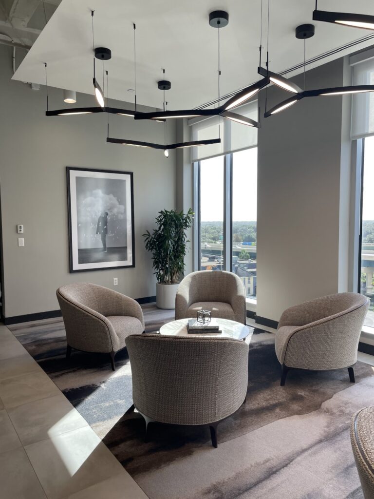 Framed landscape wall art displayed in office setting by My Favorite Art Place