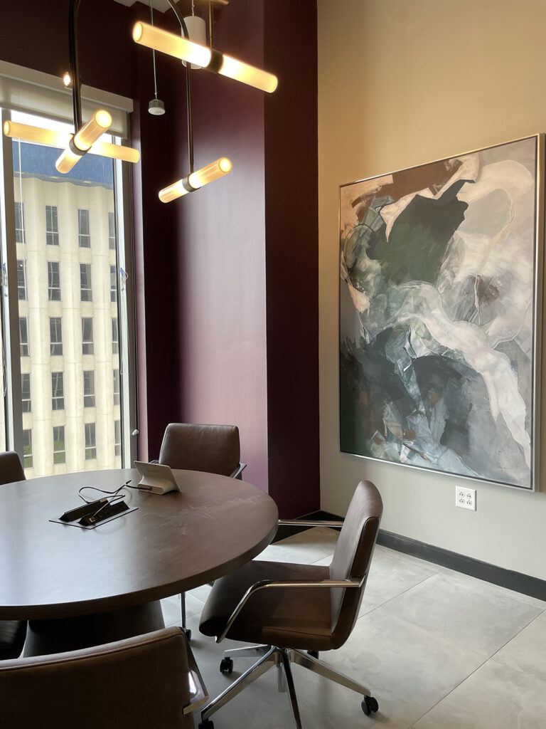 Executive meeting space featuring large framed artwork by My Favorite Art Place