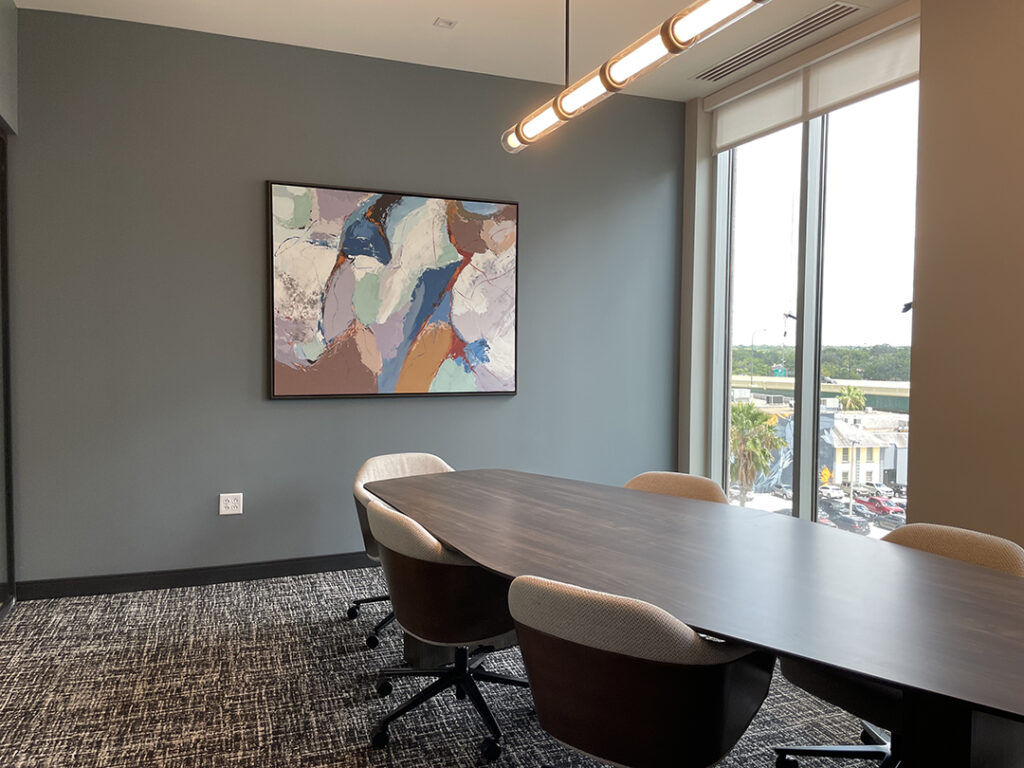 Modern office seating area with abstract wall art by My Favorite Art Place