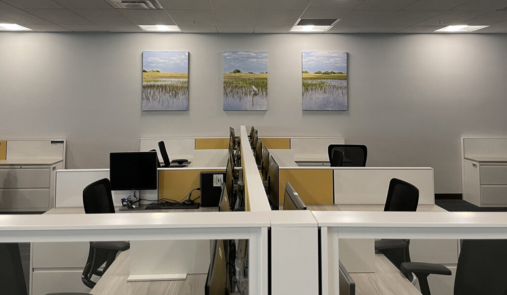 Open office workspace featuring coordinated wall art by My Favorite Art Place